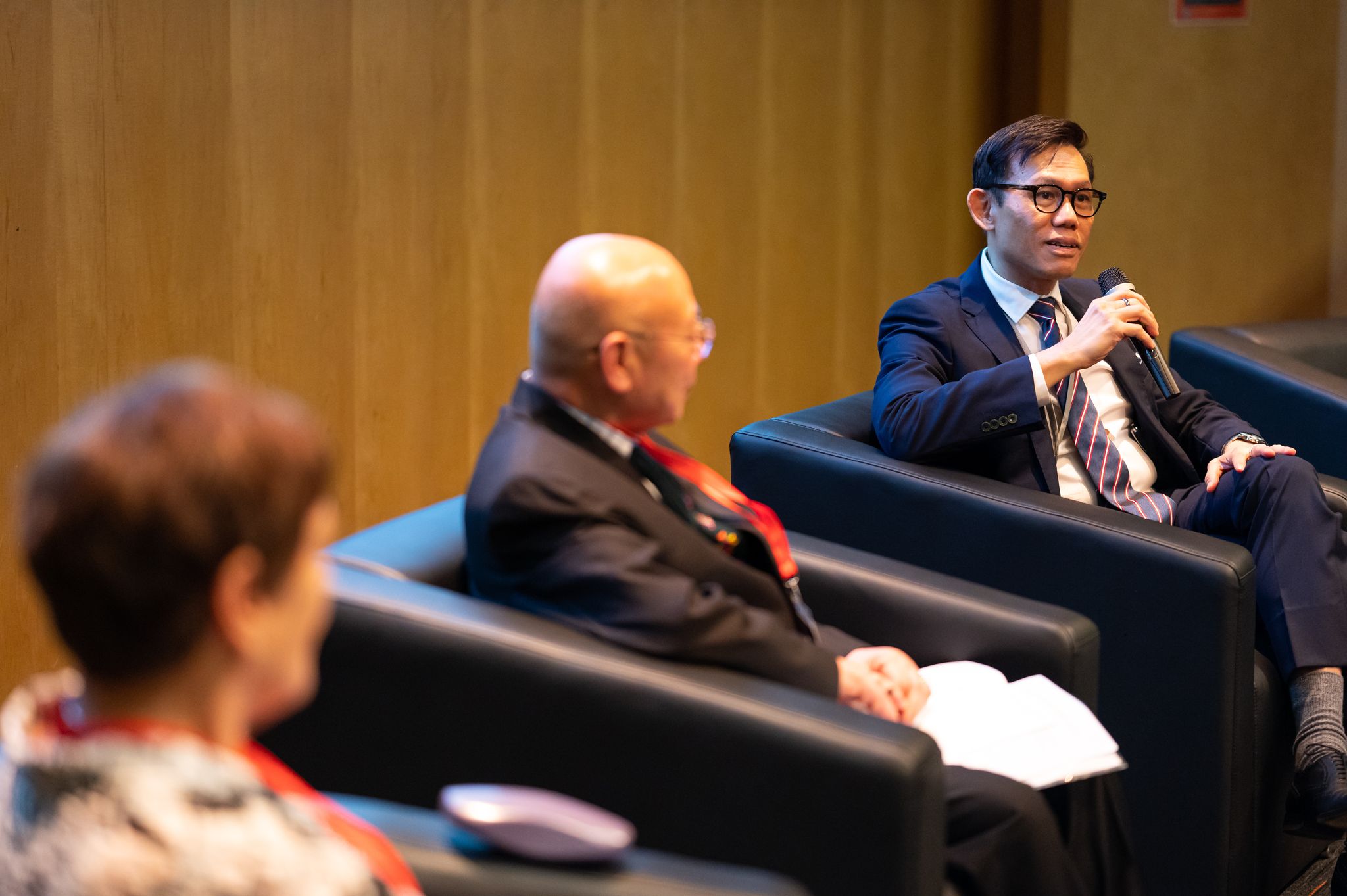 Dr. Alan Go — chairing a panel